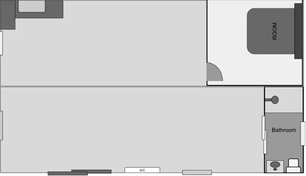 Roomi portable building floor plan showing main living area, room, and bathroom