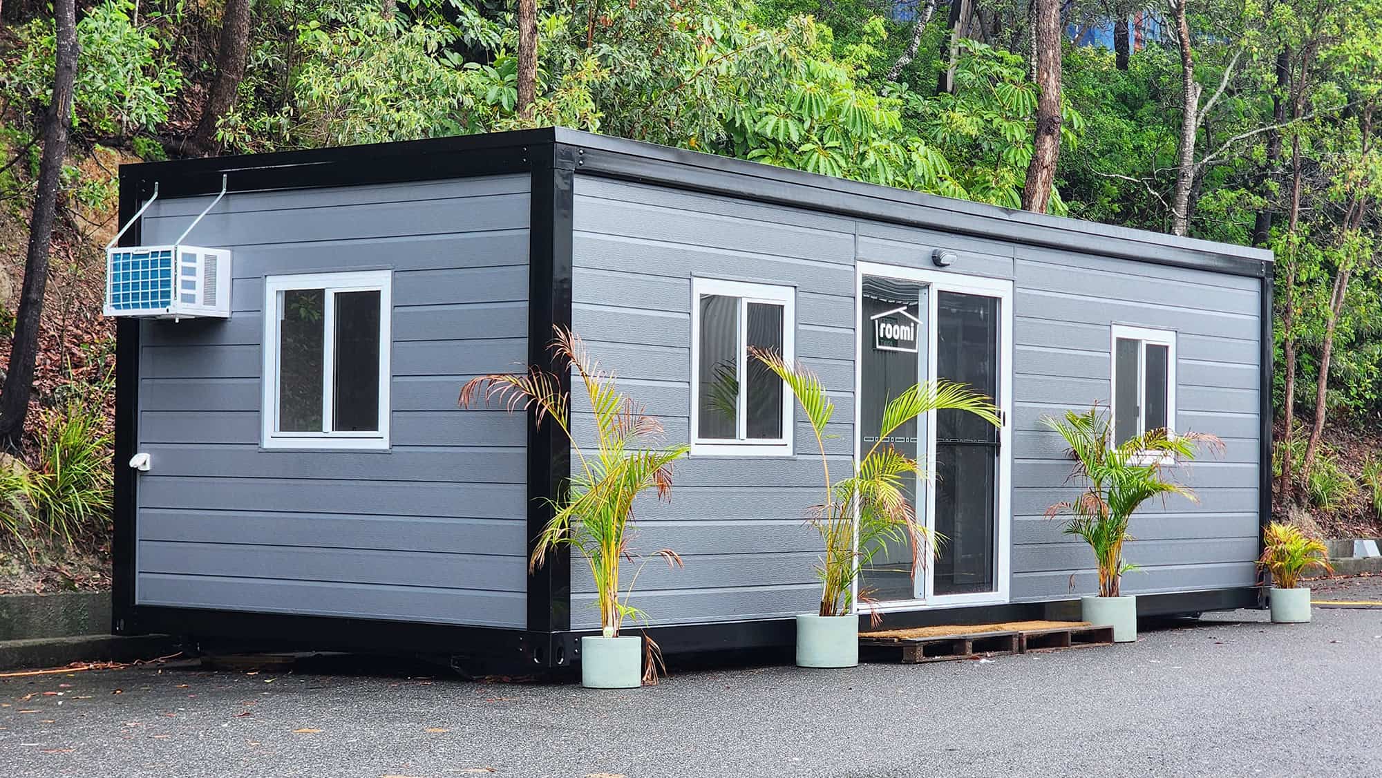 The exterior of one of our grey transportable granny flats
